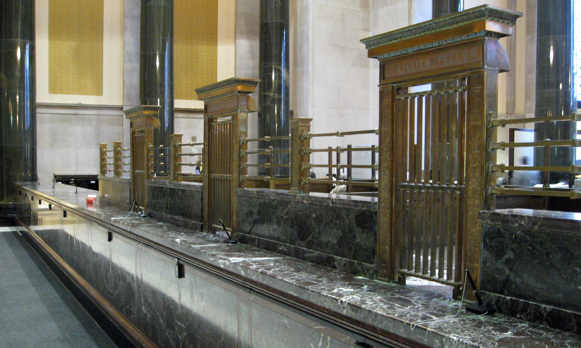 Bank of Montreal, Main Branch. Teller Counters with integrated components. Montreal, QC. Source: TRACE